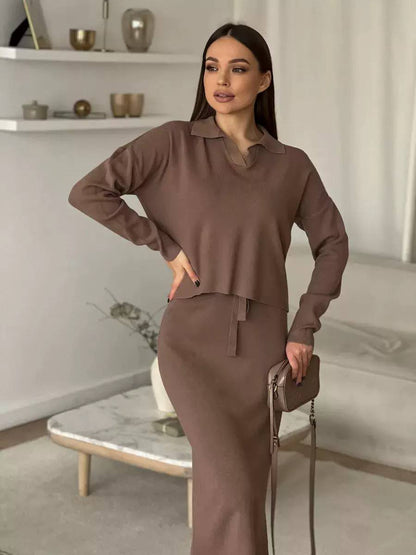 knitted two-piece matching set with collared long sleeve top and drawstring midi skirt.